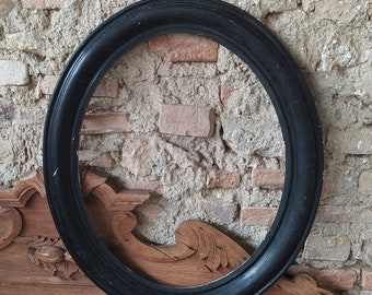 Antique oval picture frame, a large black French frame