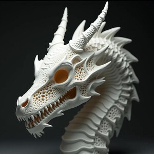 May include: A detailed, white dragon head sculpture with sharp teeth, horns, and textured scales. The dragon's eyes are a warm, amber color, and the sculpture has a detailed, porous design. The dragon's head is angled slightly, showcasing its intricate features.