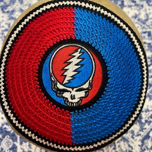 A Gratefuldead, Phish or YOUR FAVORITE rock band inspired kippah. Machine embroidered patch sewn on a coordinating crocheted kippah.