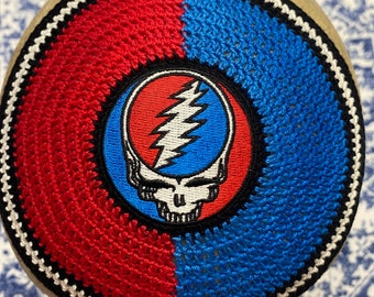 A Gratefuldead, Phish or YOUR FAVORITE rock band inspired kippah. Machine embroidered patch sewn on a coordinating crocheted kippah.