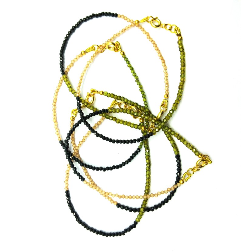 Loose Gemstone Coated Black Spinel BG91 Hessonite Peridot CZ Bracelet Gold Plated 2 mm Rondelle /& Faceted 7 Inch Long