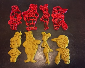 Fred, Wilma, Pebbles and Bamm-Bamm cookie cutters. Perfect for making Flintstones cookies, fondant, playing with Play-Doh or any soft clay.