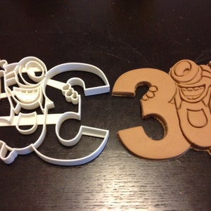 Minions Cookie Cutter holding the number 3 for your kid&#39;s 3rd birthday party! Celebrate their third year. Great for cookies and Play-Doh