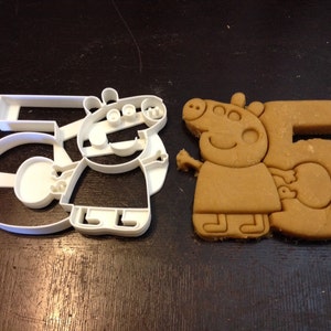Peppa Pig Silhouette Cookie Cutter holding the number 3 Celebrate their 3rd year! Great for your kid/'s third birthday party