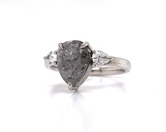 Platinum salt and pepper diamond trilogy ring