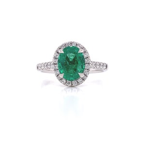 Platinum emerald and diamond engagement ring