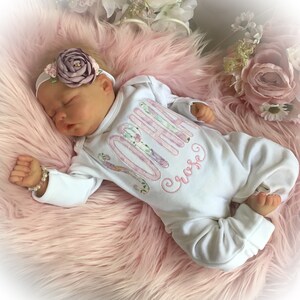 Personalized Newborn Girl Romper: Floral Appliqué Coming Home Outfit