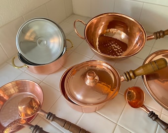 Juego de 11 piezas: wok de cobre, sartén pequeña, sartén mediana, olla, cacerola y cucharones.
