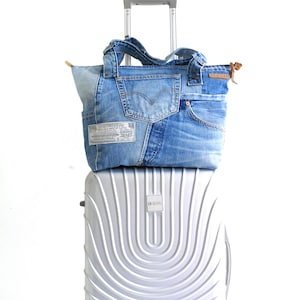 Womens denim travel bag, Travel tote with trolley sleeve,Trolley bag, Recycled denim travel tote, Leather tote with trolley sleeve, Lowieke zdjęcie 1