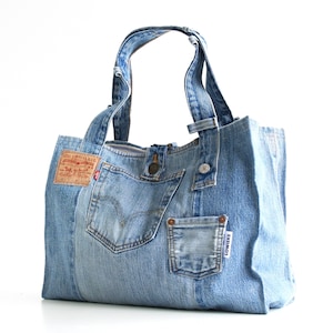 Recycjeans bag from an old Levi's 501 with lots of pockets, a cotton lining and the original details.