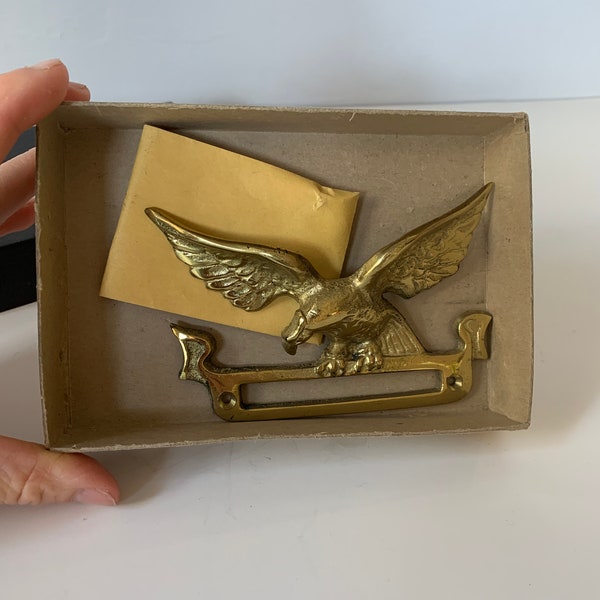 Vintage brass eagle mail slot, guard, wall mount. Stamped 716E