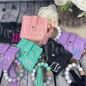 Llavero de pulsera con cuentas/cartera de identificación