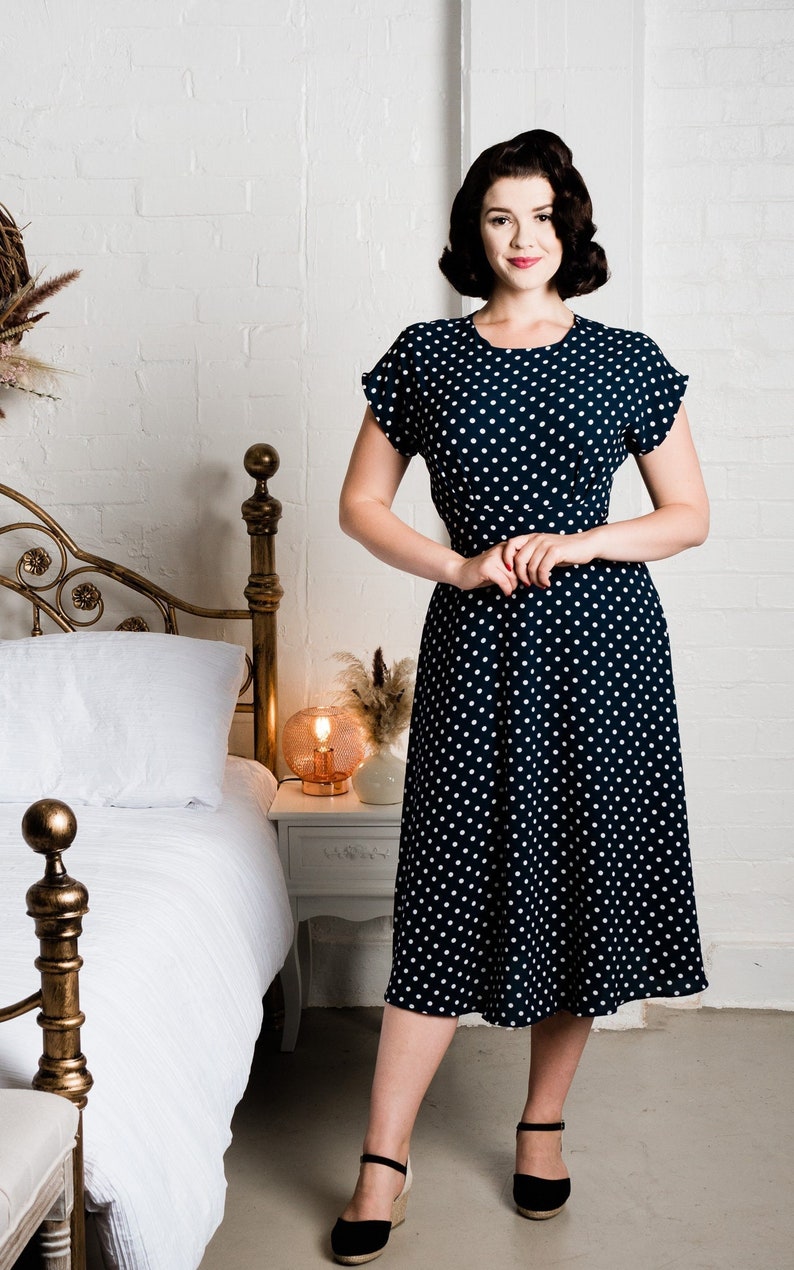 1940s Clothing & 40s Fashion or Women     1940s vintage inspired teadressnavy and white polkadot print. Made to order.  AT vintagedancer.com