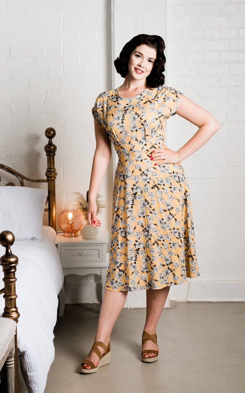 1940s Dresses | 40s Dress, Swing Dress, Tea Dresses 1940s vintage inspired teadress golden yellow with grey floral viscose Lady McElroy print. Made to order. $130.38 AT vintagedancer.com