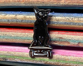 Grizzly the shop cat enamel pin