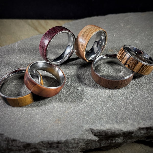 Handcrafted Exotic Wooden Rings with an inner Stainless-Steel Core