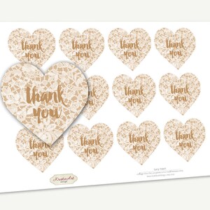 May include: Printable sheet of 10 heart-shaped thank you stickers with a lace design and brown text. The text on the stickers reads "Thank You".