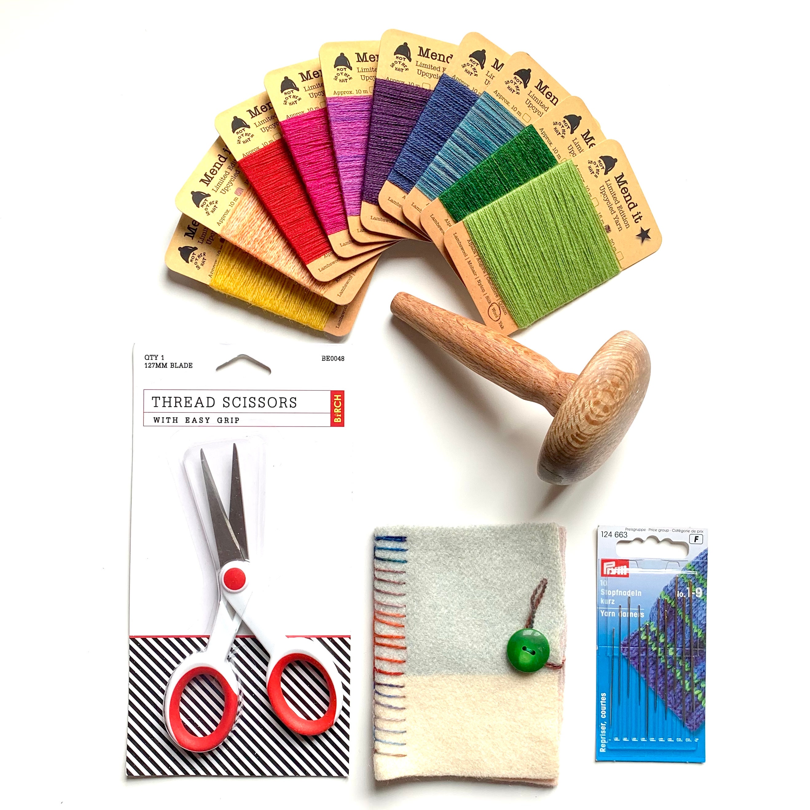 A COLLECTION of ITEMS in a DARNING and SEWING MILITARY REPAIR KIT with  NEEDLES Stock Photo - Image of darning, light: 244746570