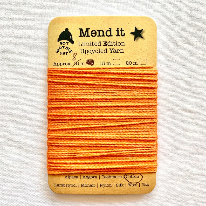 visible mending yellow orange red repurposed clothing repair jeans Trio re-made zero waste upcycled eco Cotton mending yarn