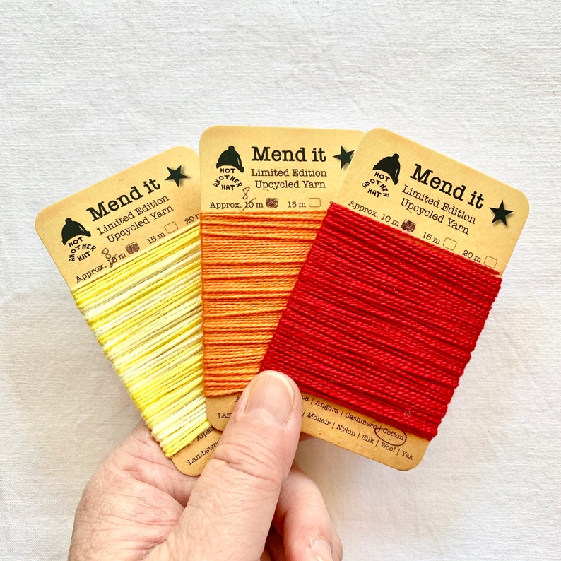 visible mending yellow orange red repurposed clothing repair jeans Trio re-made zero waste upcycled eco Cotton mending yarn