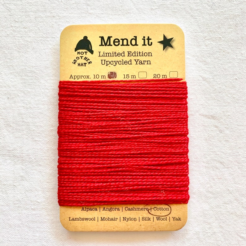 visible mending yellow orange red repurposed clothing repair jeans Trio re-made zero waste upcycled eco Cotton mending yarn