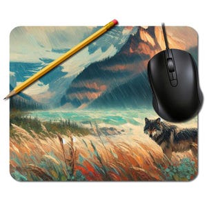 May include: Mouse mat with a landscape painting of a wolf, mountains, and a lake. A yellow pencil and a black computer mouse are on the mat. The artwork uses muted colours and a painterly style, creating a scenic image.