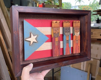 Tres Reyes Magos (Three wise men) hand carved 6" Tall with the Puerto Rico Flag behind on a 8 1/2”x 12 1/2” wall mount frame