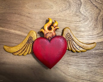Sagrado Corazon (Winged Sacred heart) in wood frame.