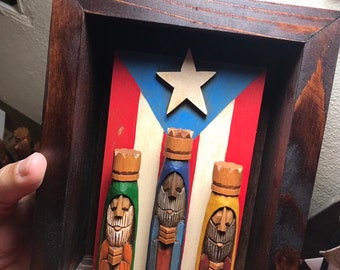 Tres Reyes Magos (Three wise men) hand carved 4" Tall with the Puerto Rico Flag behind on a wall mount frame.