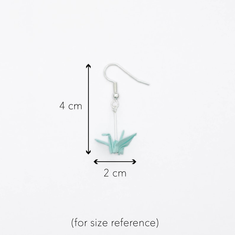 An example of the size of the earrings. They are two centimetres in width and four centimetres in length.