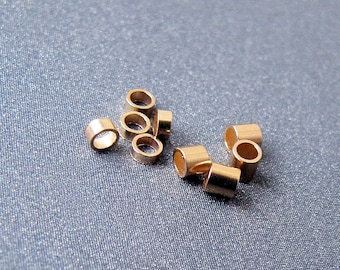 14k gouden knijpkraal • 1,5 x 2 mm 2 x 1 mm 2 x 2 mm • Massieve 14 karaat gouden buiskralen • Tarief gratis verzending naar de VS