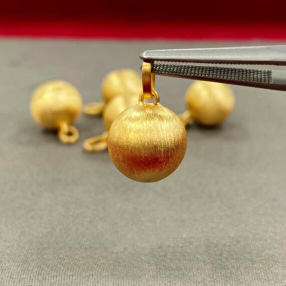 Orecchini a sfera in oro 18 Kt lisci Orecchini a sfera in oro 18 Kt lisci