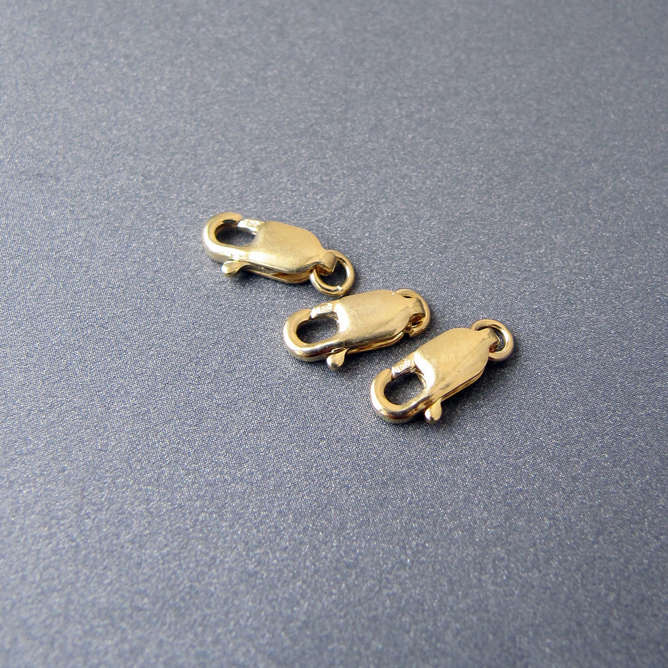 14K Gold Yellow 10.5x4.5mm Pear Shaped Swivel Trigger Lobster