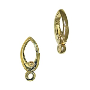 May include: Two gold-toned metal lobster claw clasps with a spring-loaded mechanism. The clasps are oval-shaped and have a smooth, polished finish.
