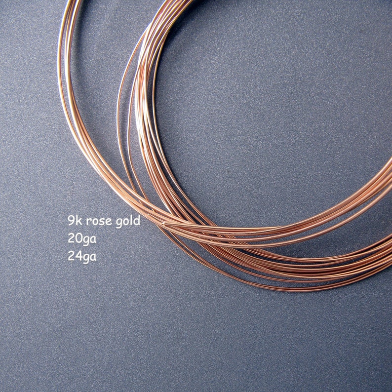 May include: Close-up of a coil of 9k rose gold wire in 20ga and 24ga gauges.