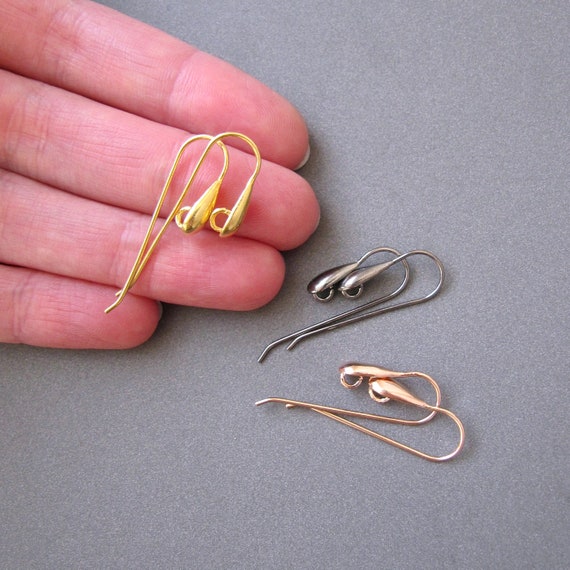 una clip no foro argento 925 placcato oro giallo Italy