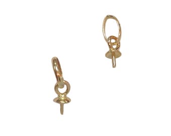 May include: Two gold-toned pearl clasps with a loop at the top and a pin at the bottom.