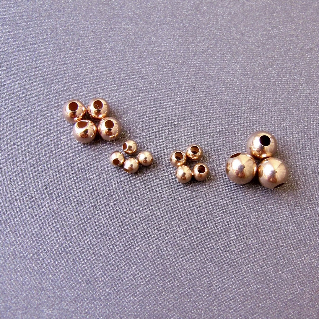 Approx. 2-Gram Bag (Over 100pcs) 2x1.2mm Brass Crimp Beads, Rose Gold -  Bead Box Bargains