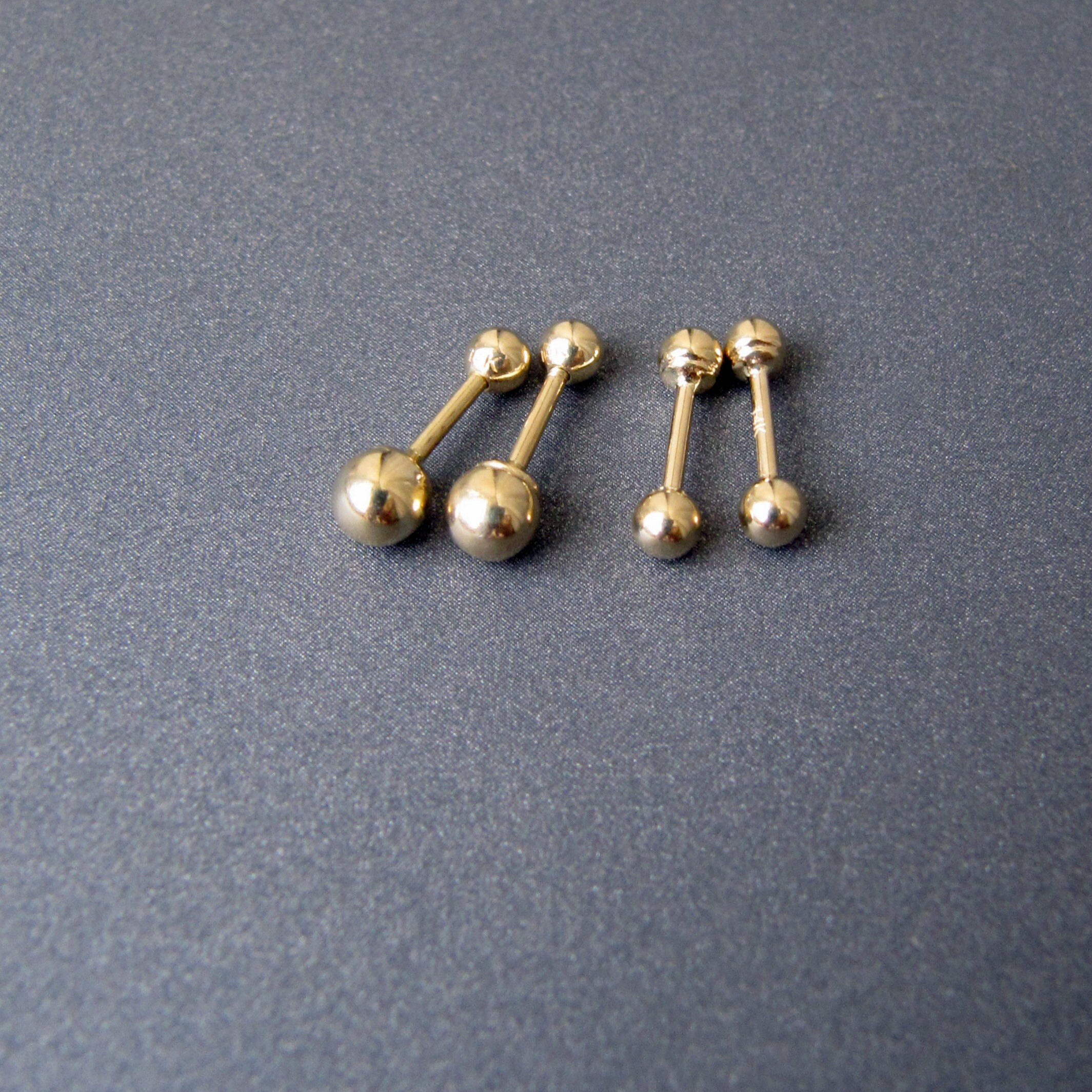 Gold barbell earrings deals