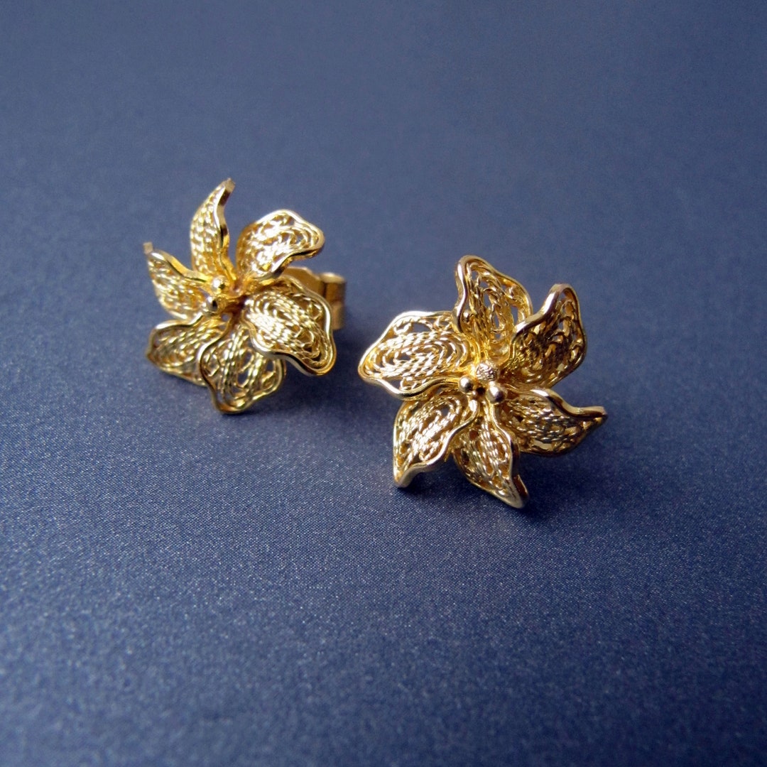 Gold and Rhinestone Earrings —