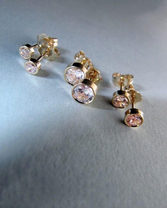 14k Gold-plated 3/4 Hoop Earrings with Cubic Zirconia Studded Leaf Charms 14k Gold-plated 3/4 Hoop Earrings with Cubic Zirconia Studded Leaf Charms