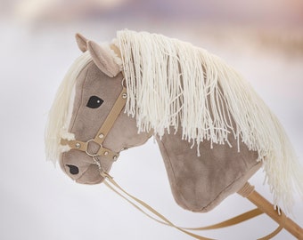 Hobby horse with a halter (with fur) and reins