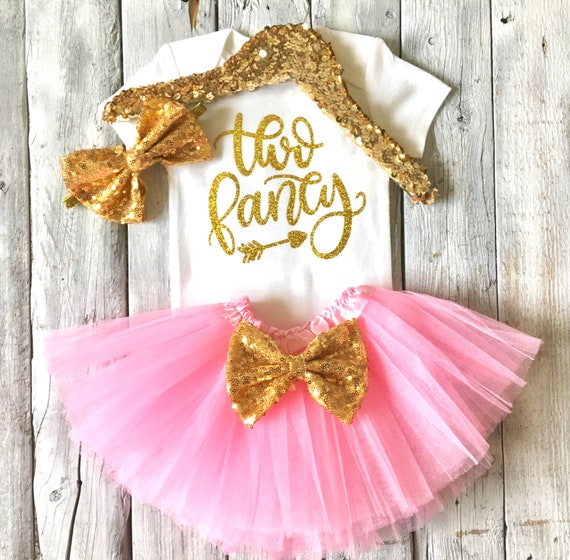 pink and gold outfit