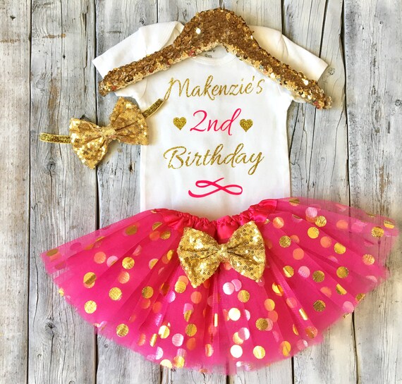 hot pink and gold outfit
