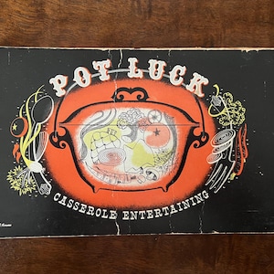 May include: A vintage cookbook titled "Pot Luck Casserole Entertaining" with a black cover and a colorful illustration of a pot filled with various foods.