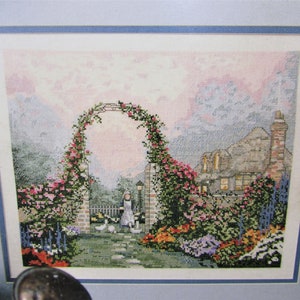 Rose Arbor Cottage Cross Stitch Pattern/ Thomas Kinkade Leisure Arts.  English Cottage with garden counted cross stitch chart picture