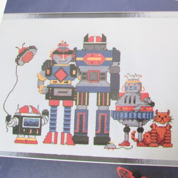 Robot Child es Room Cross Stitch Pattern/Cross Stitch, 1987.  Spielzeug-Roboter & Katze leicht gezählte Kreuzstich-Diagramm.  Ideal für ein Zimmer