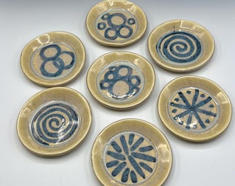 Small dishes with hand-painted patterns