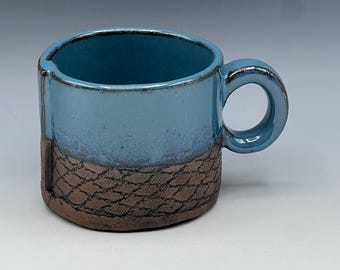 Hand-Built cappuccino mugs with leather look texture and light blue glaze