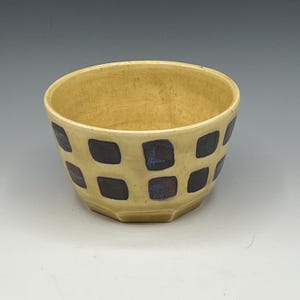 Cream patterned prep bowls with speckled hand-painted designs that nest to stack-sold individually